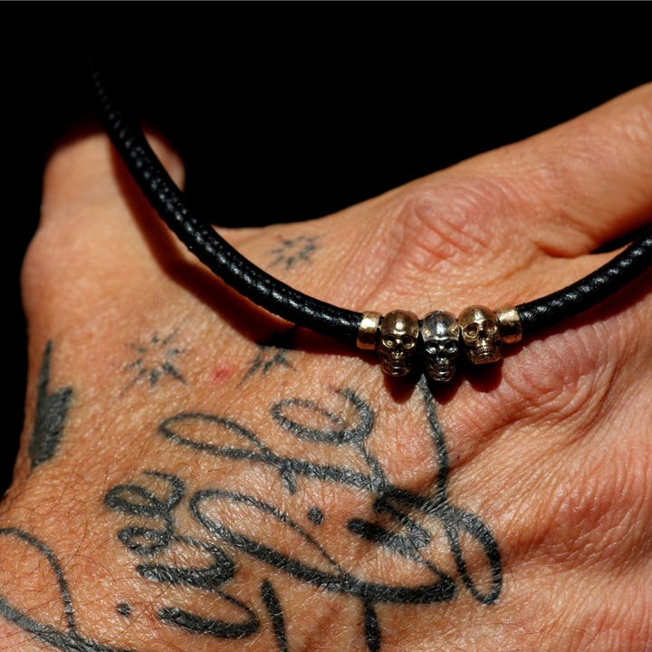 Collar Calavera Rif de Plata 925, cuero y bronce