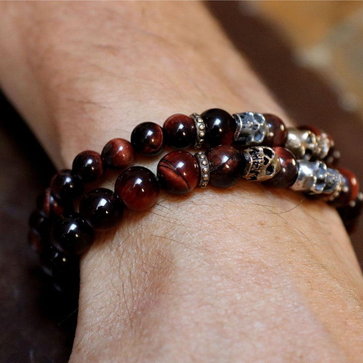 Kaizen bull's eye bead bracelet with 925 silver and bronze skulls