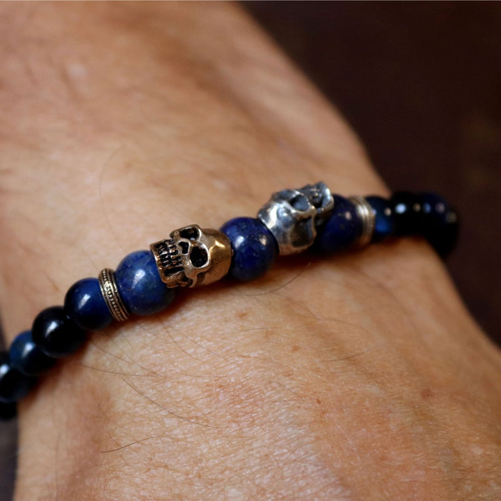 Yūrei blue tiger's eye bead bracelet with 925 silver and bronze skulls