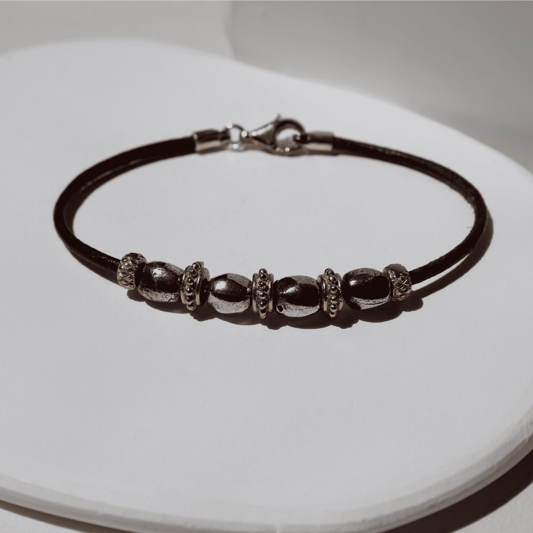 Pulsera Mujer Kojin de cuero fino con óvalos de plata 925 y cuentas de bronce