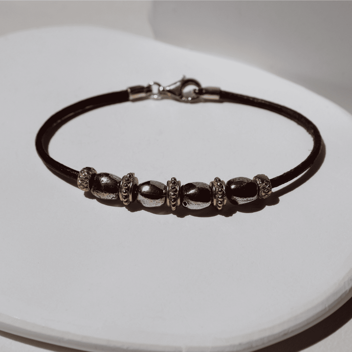 Pulsera Mujer Kojin de cuero fino con óvalos de plata 925 y cuentas de bronce