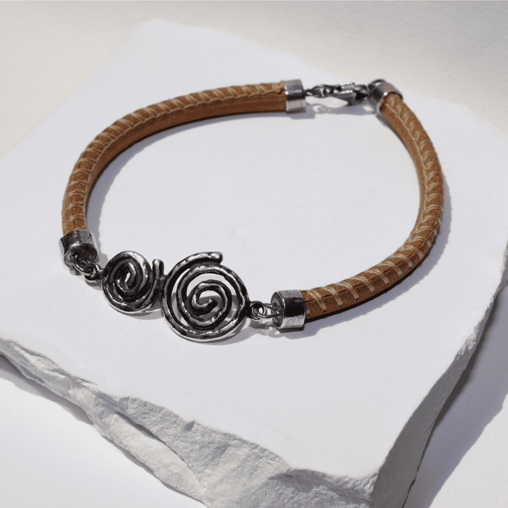 Yugen women's leather bracelet with two 925 silver spirals