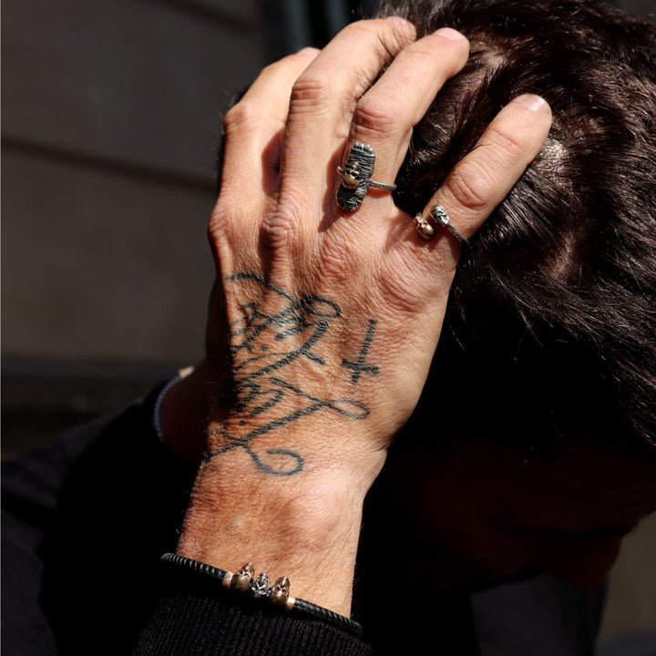 Anillo Calavera Rif de Plata 925, cuero y bronce