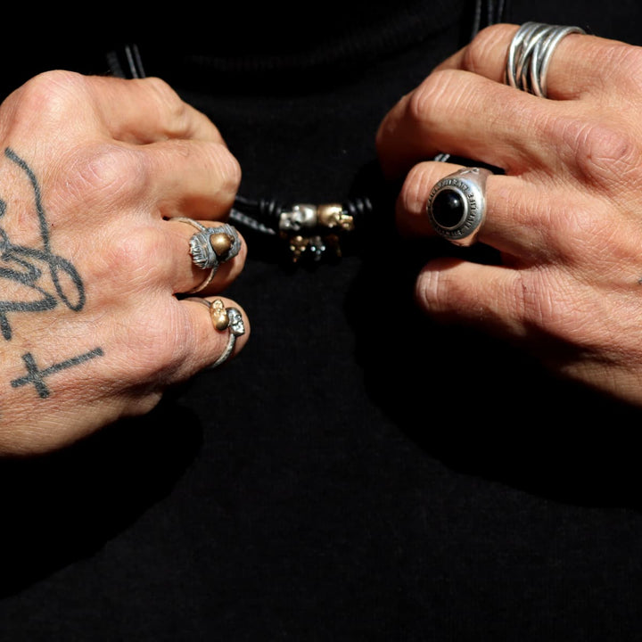 Anillo Calavera Rif de Plata 925, cuero y bronce