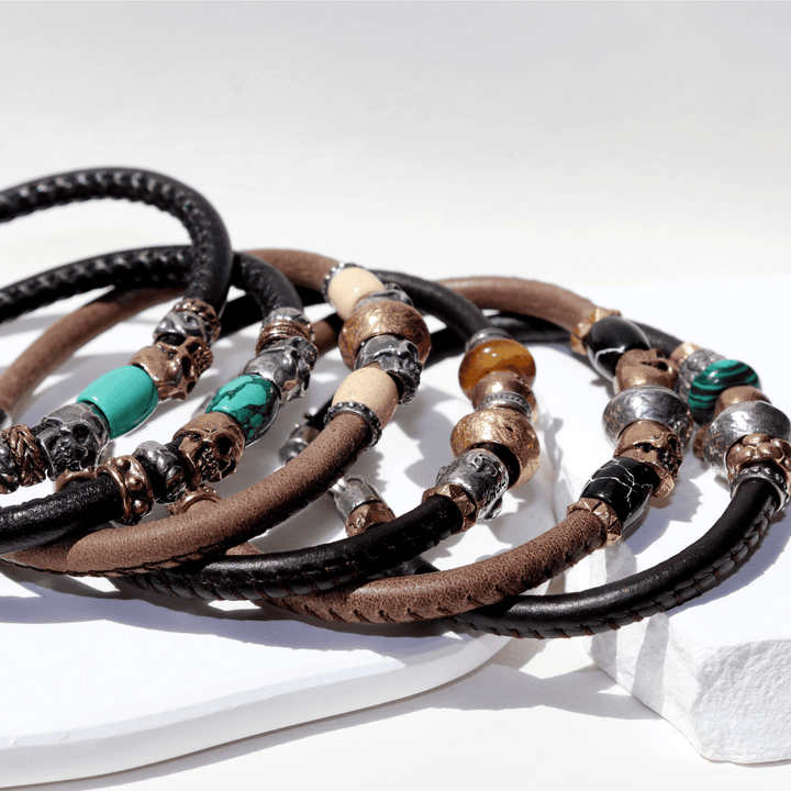 Tatakai leather bracelet with bronze skull and tiger's eye resin
