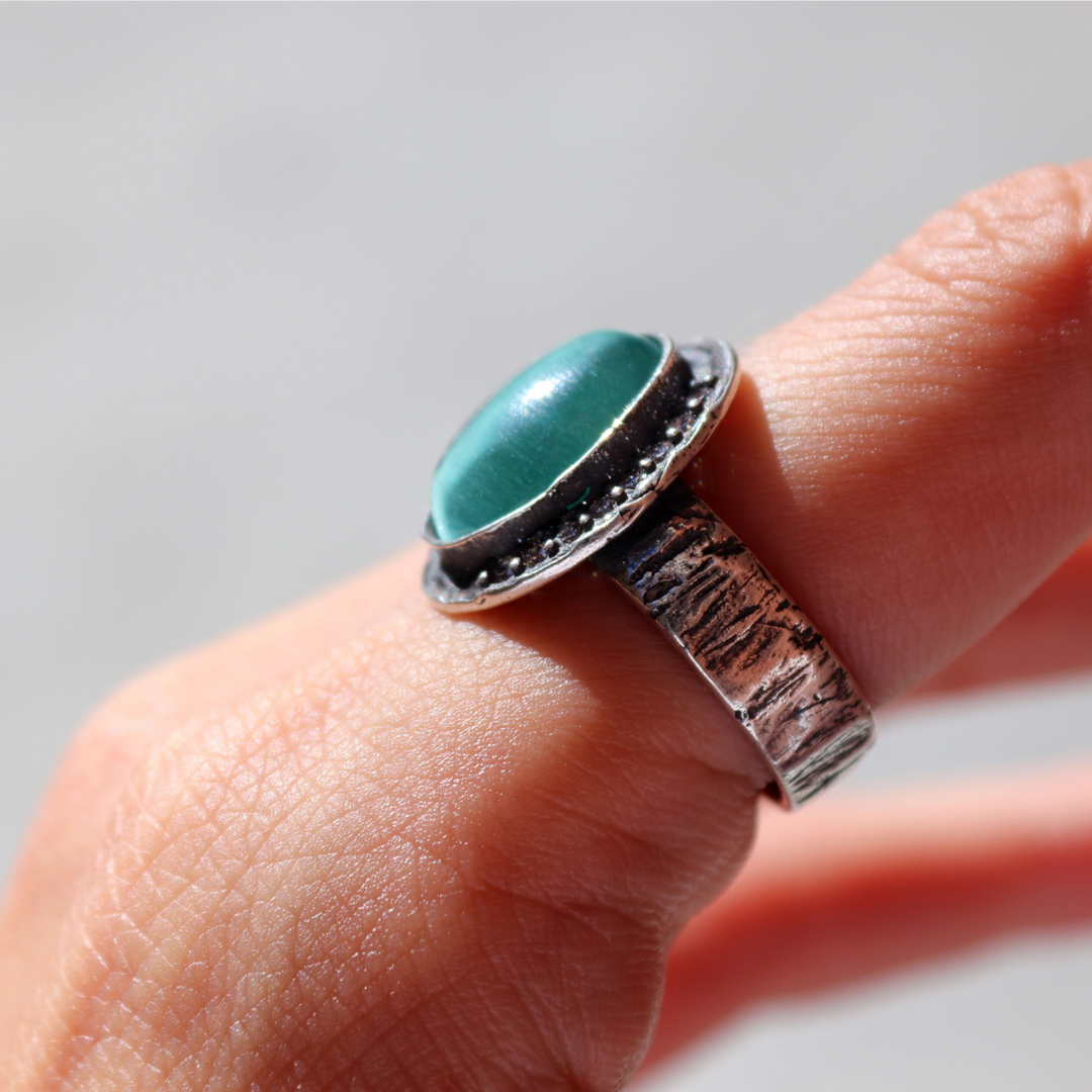 Meikai Damenring aus 925er Silber und türkisfarbenem Stein 