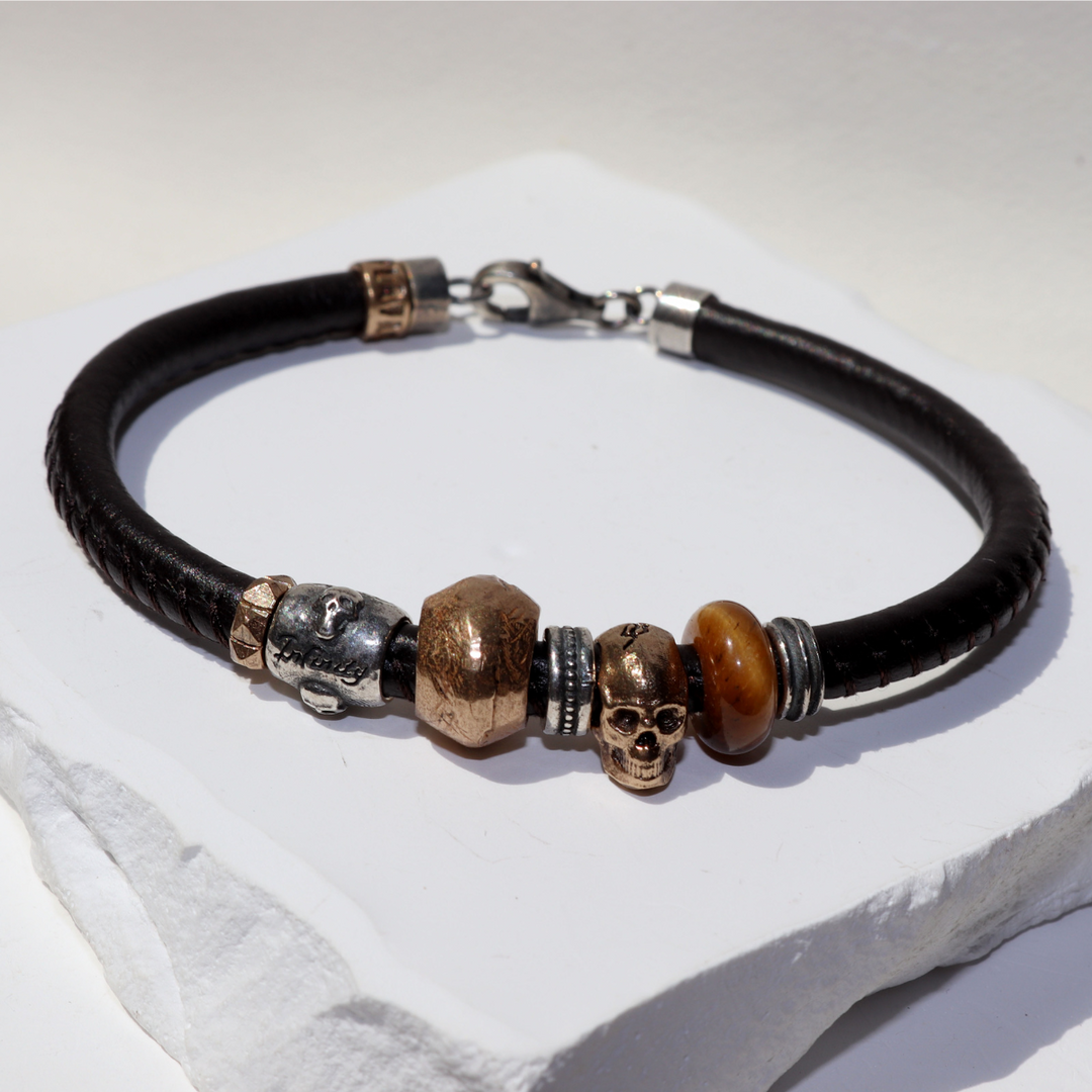 Tatakai leather bracelet with bronze skull and tiger's eye resin