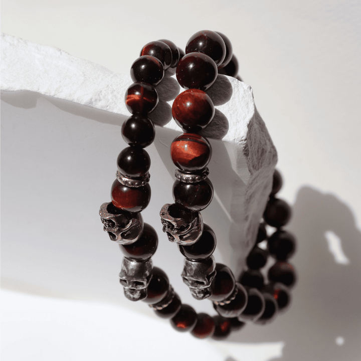 Kaizen bull's eye bead bracelet with 925 silver and bronze skulls