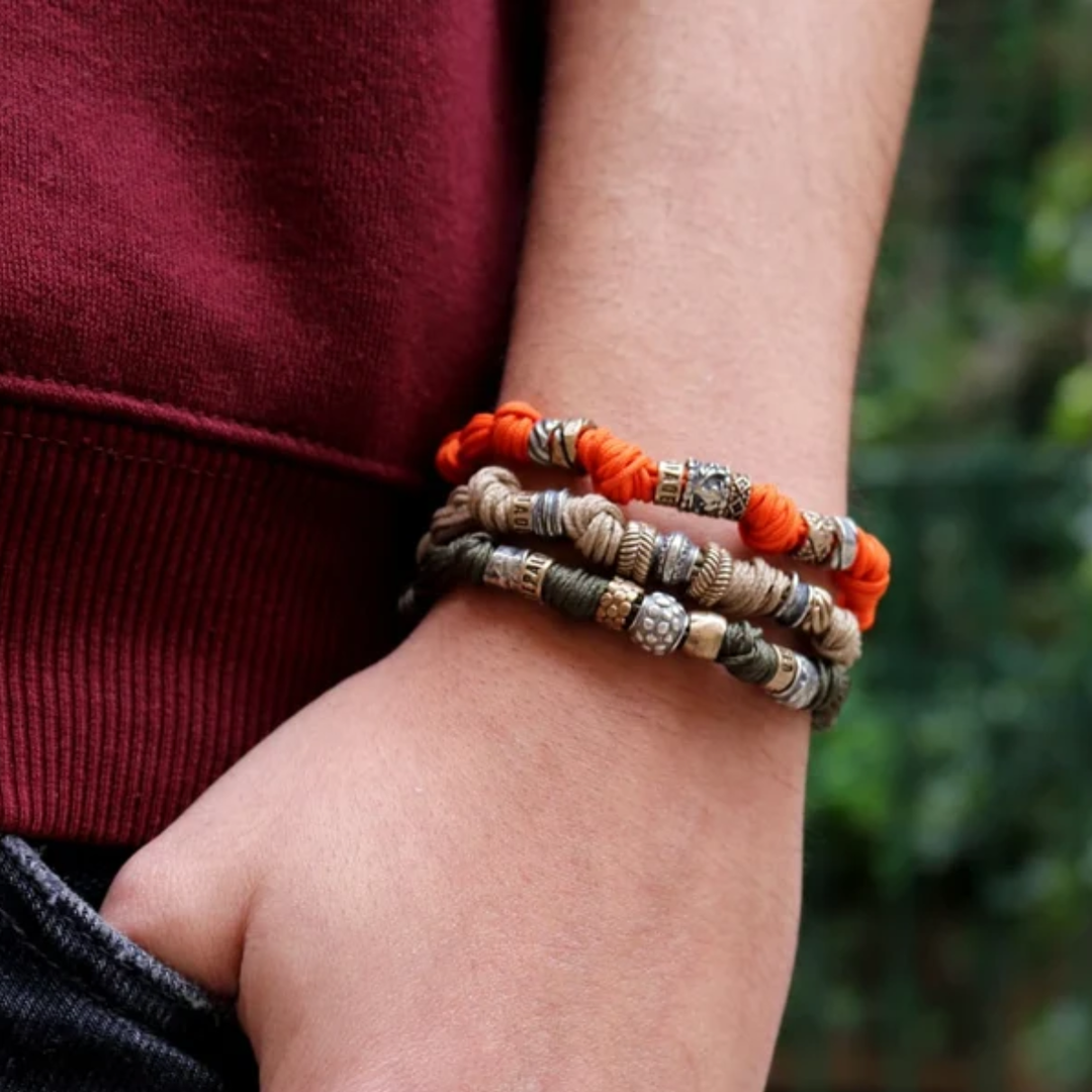 Pulsera Hombre Yan de nylon naranja con nudos y plata 925