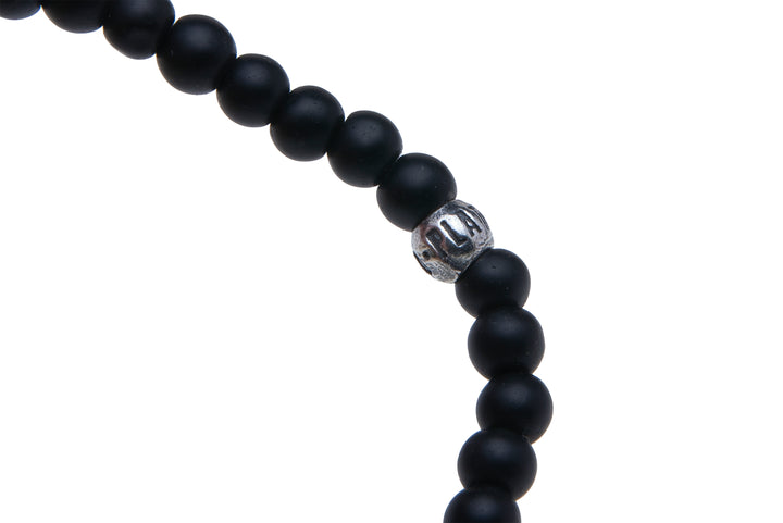 Pulsera Mujer Zaira de bronce, ónix y circonitas