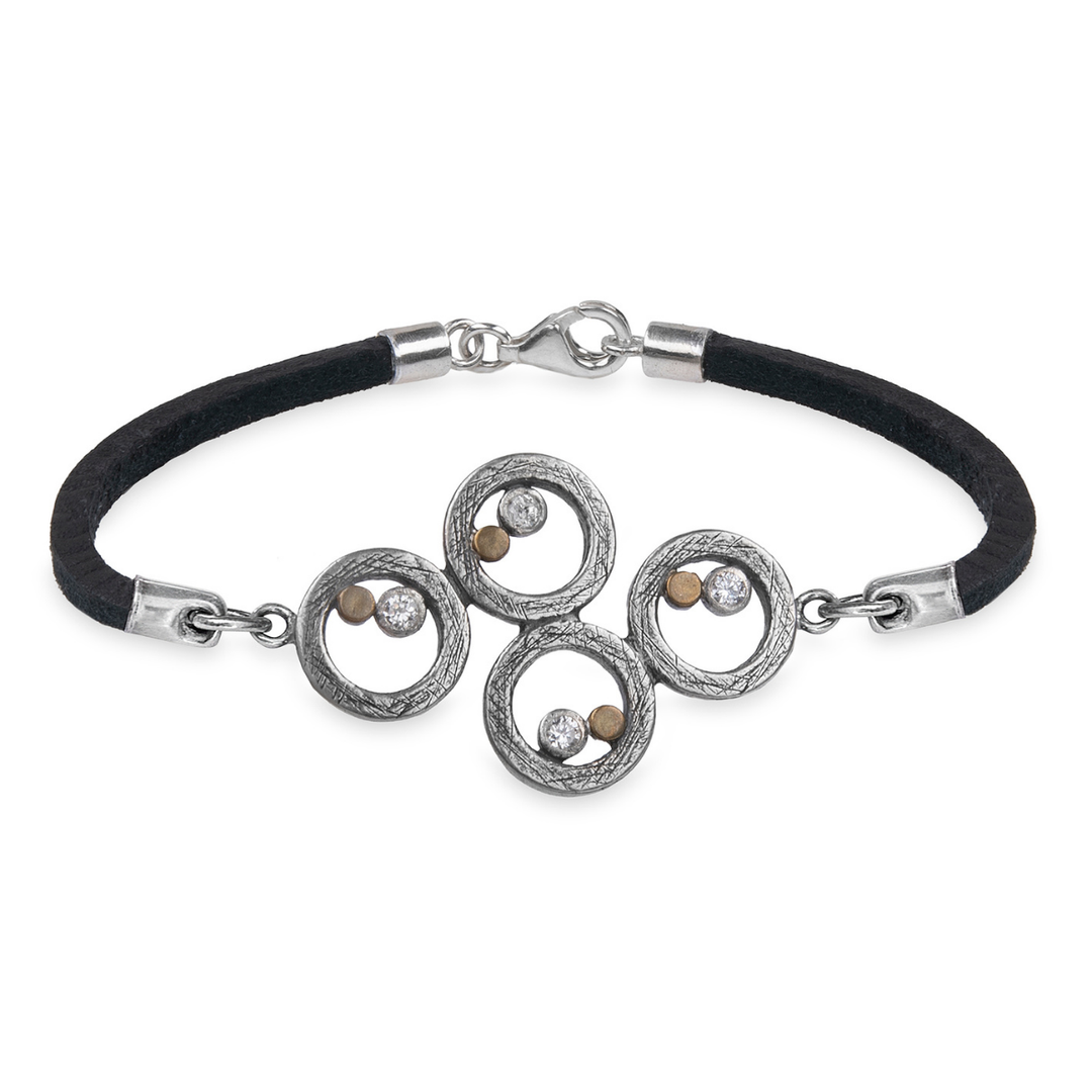Damen-Lederarmband mit 925er Silberspiralen und bronzenen Punkten