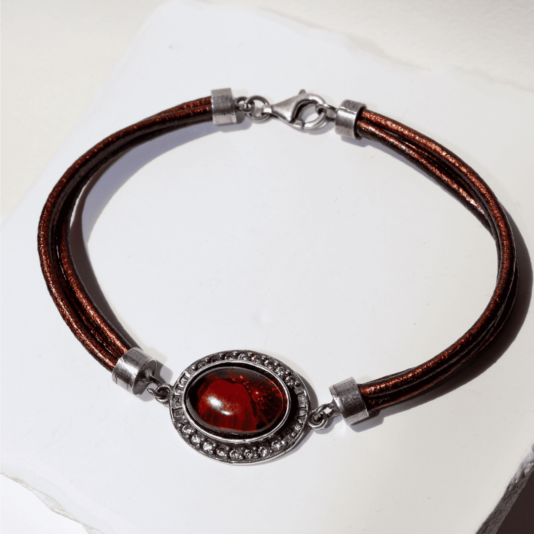 Kurai Damen-Lederarmband mit 925er Silbermitte und Granat- und Zirkonsteinen